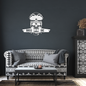 Aamplified_Bass_or_Die_Metal_Skull_White_Dark_Living_Room_Mockup.png