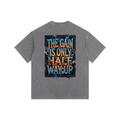 Gray t-shirt with colorful text design on a white background