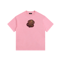 Pink t-shirt with a logo on a white background