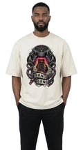 Man wearing a white t-shirt with a graphic design on a white background