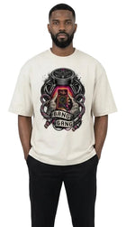 Man wearing a white t-shirt with a graphic design on a white background