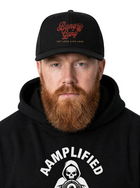 Man wearing a black cap with red text and a black hoodie with white text and graphic.