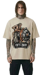 Person wearing a beige t-shirt with graphic design and text on a white background