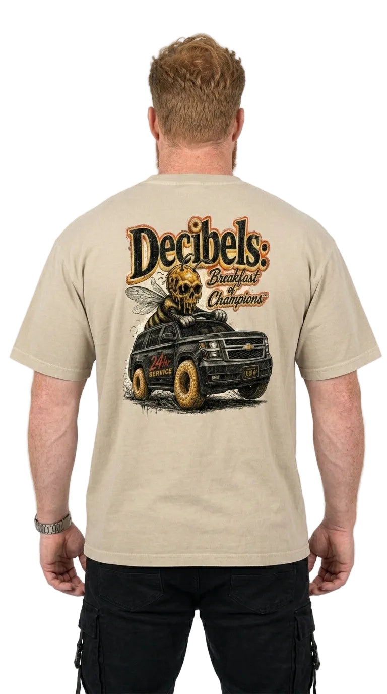 Man wearing a beige t-shirt with a graphic design on the back, featuring a truck and text.