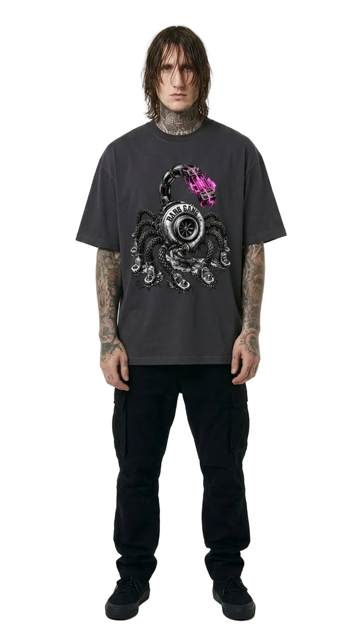 Person wearing a dark gray t-shirt with a graphic design on a white background