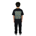 Person wearing a black t-shirt with text on the back against a white background