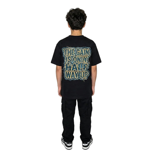 Person wearing a black t-shirt with text on the back against a white background