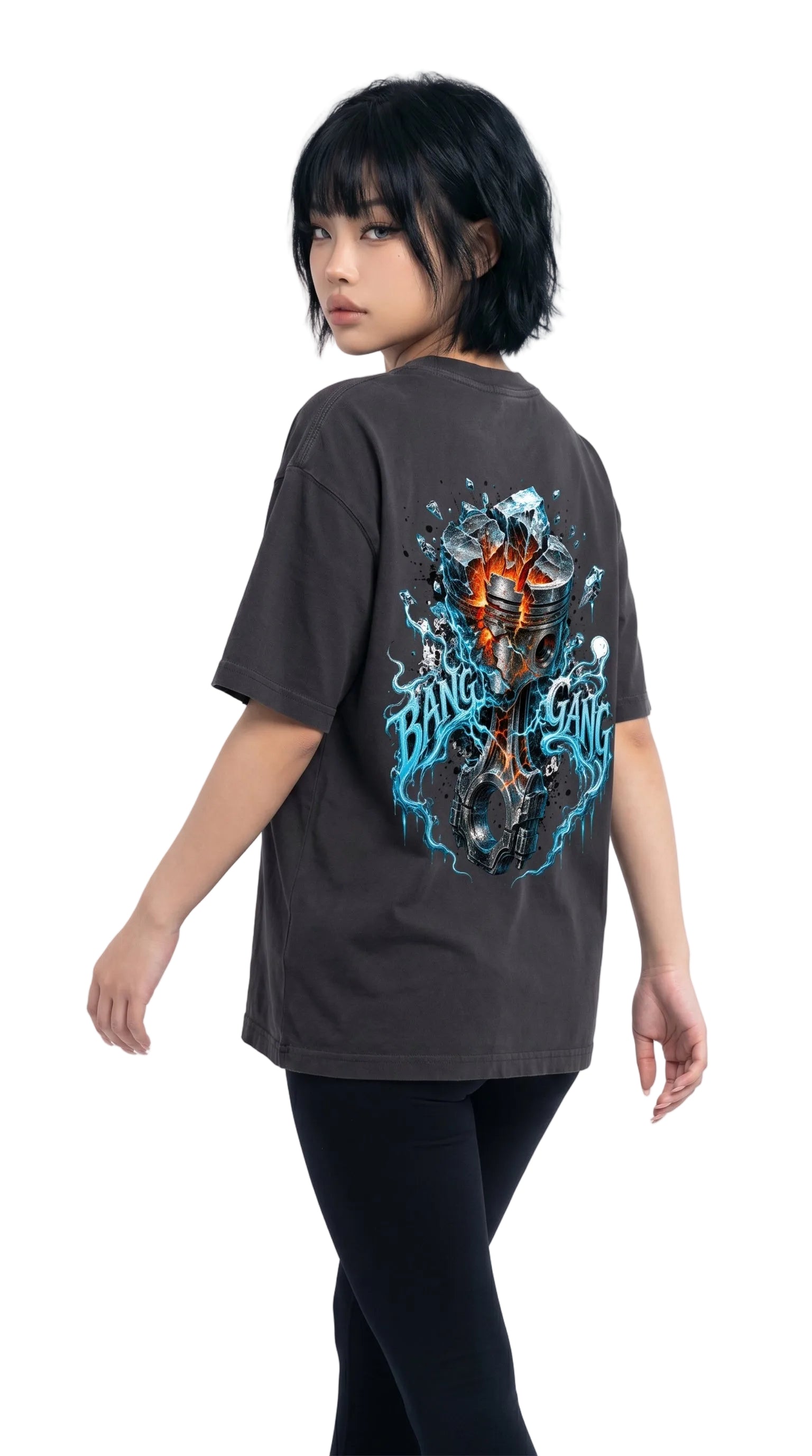 Person wearing a dark gray t-shirt with a colorful graphic design on the back, standing against a white background.