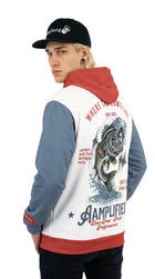 Person wearing a colorful hoodie with graphic design on the back, standing against a white background
