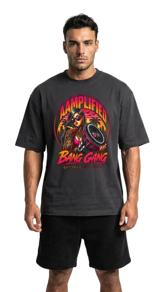 Man wearing a black t-shirt with a colorful graphic design on a white background