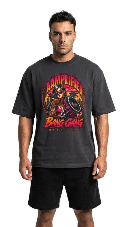 Man wearing a black t-shirt with a colorful graphic design on a white background