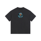 Black t-shirt with 'KODA' logo on a white background
